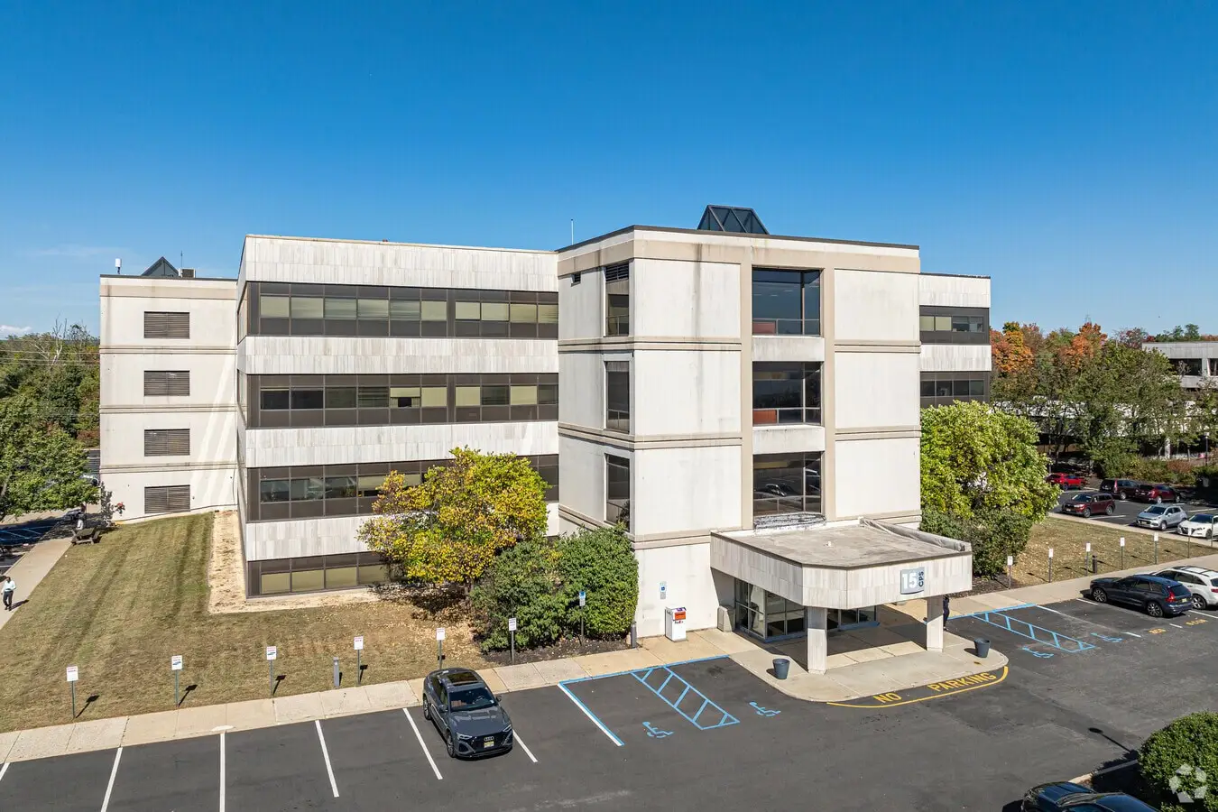 Four storey office building with various sized units